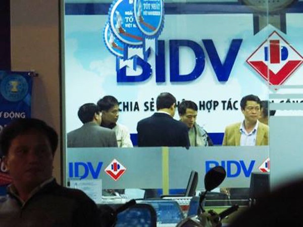 Vu cuop ngan hang: Cong an len tieng ve so tien thuong nong hinh anh