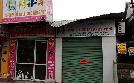 Ten cuop nhi dung dao dam chu cua hang ban sim cuop 9 trieu hinh anh