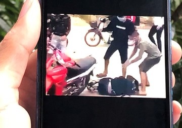 Nam sinh lop 10 bi vay danh bang hung khi hinh anh