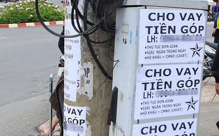 Bat nguoi phu nu cho vay lai hon 547%/nam hinh anh