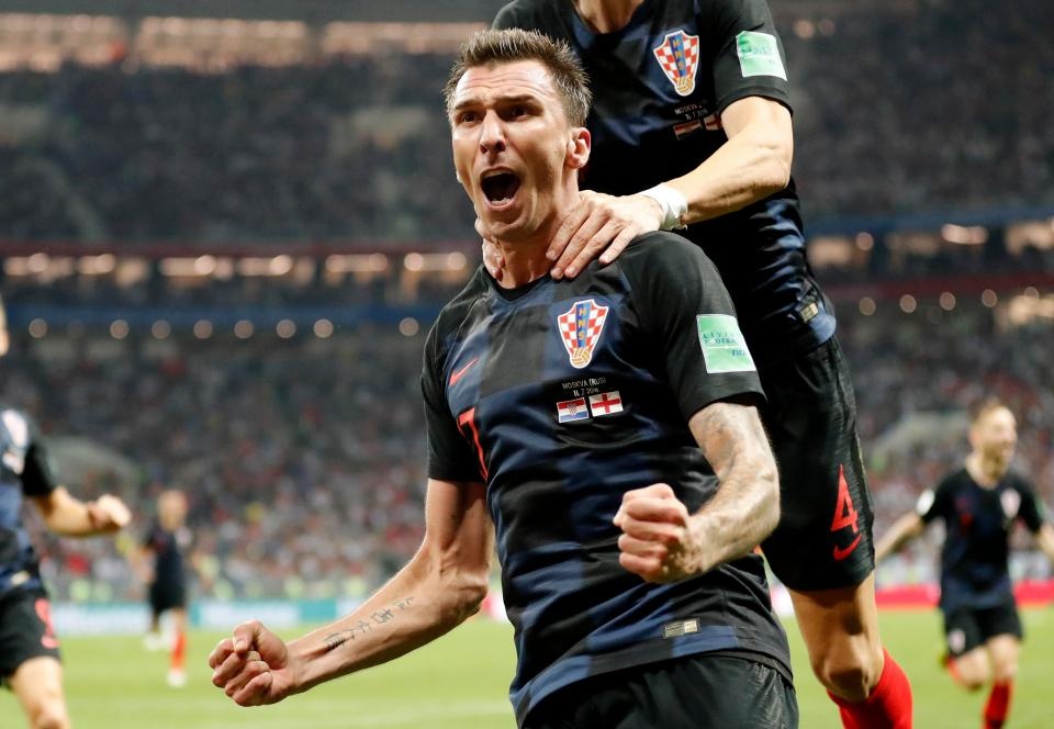Olivier Giroud va Mario Mandzukic: Nhung mon do co dat gia hinh anh