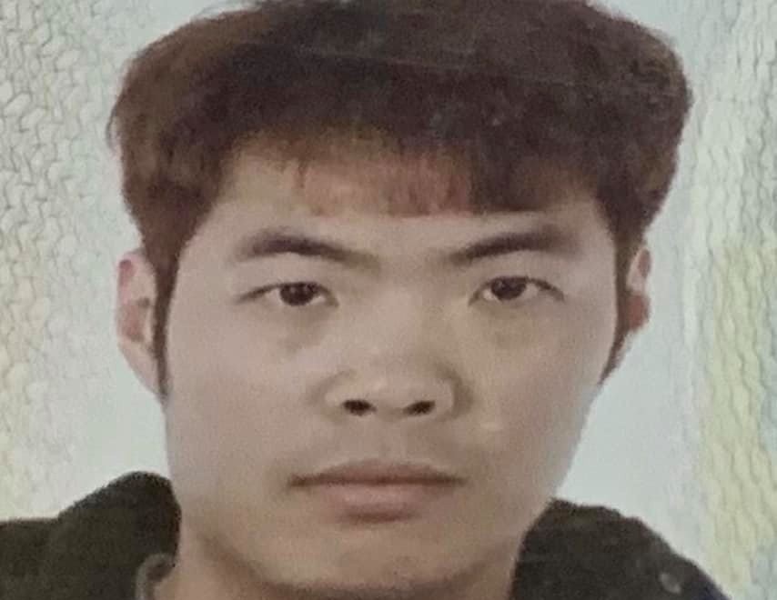 Ban giao ke tron truy na cho Cong an Trung Quoc hinh anh