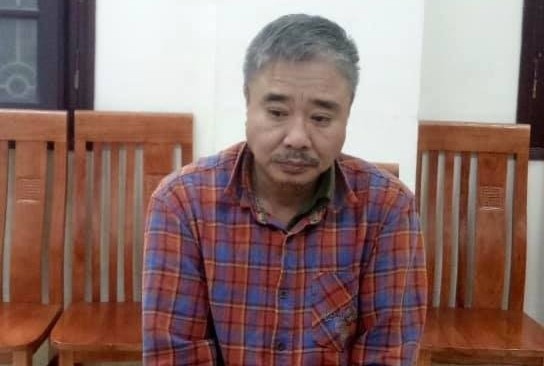 Tai xe GrabBike mao danh canh sat anh 1