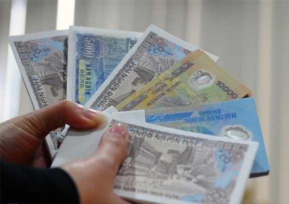 Hanh vi doi tien le de kiem loi dip Tet co the bi phat toi 80 trieu hinh anh