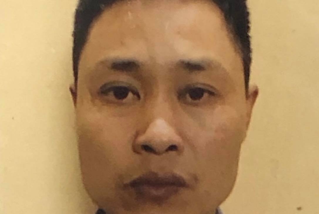 Nguoi dan ong dau thu sau 3 nam tron lenh truy na hinh anh