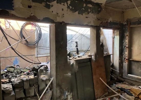 Hai xac kho trong buc tuong sieu thi o Trung Quoc hinh anh