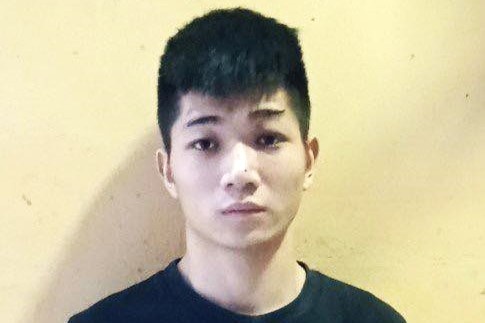 Nam thanh nien bi truy na dac biet dung dao chong tra cong an hinh anh