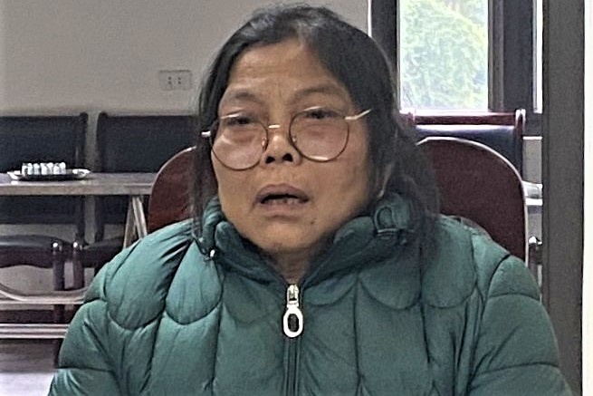 Chong canh gioi cho vo moc tui tai le hoi hinh anh