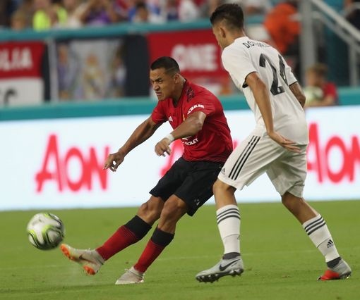 MU danh bai Real Madrid anh 1