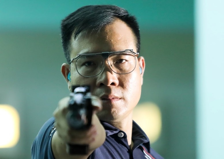 Hoang Xuan Vinh dung buoc o noi dung tung gianh HCV Olympic hinh anh