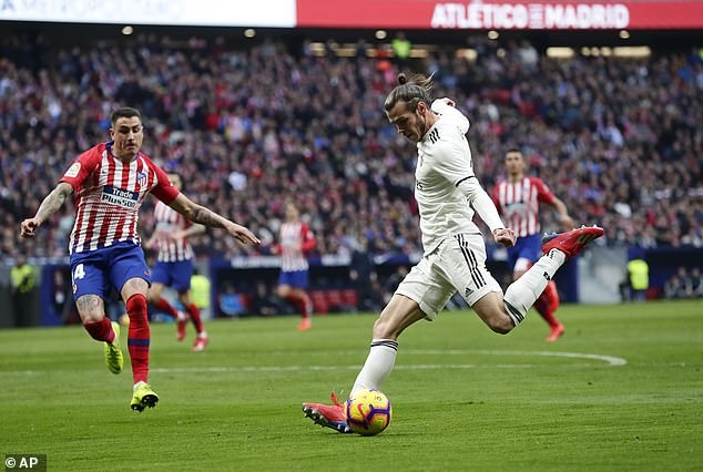 Gareth Bale doi mat voi an treo gio 12 tran sau tran derby Madrid anh 2