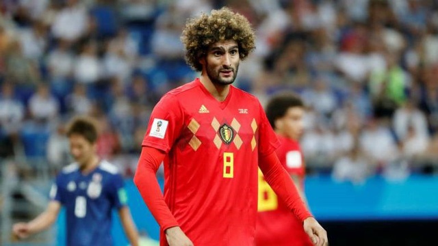 Fellaini tuyen bo gia tu su nghiep thi dau quoc te hinh anh