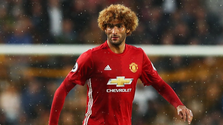 Fellaini tuyen bo gia tu su nghiep thi dau quoc te anh 1