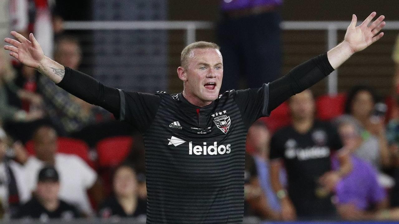 Wayne Rooney ung ho Man City vo dich Premier League hinh anh