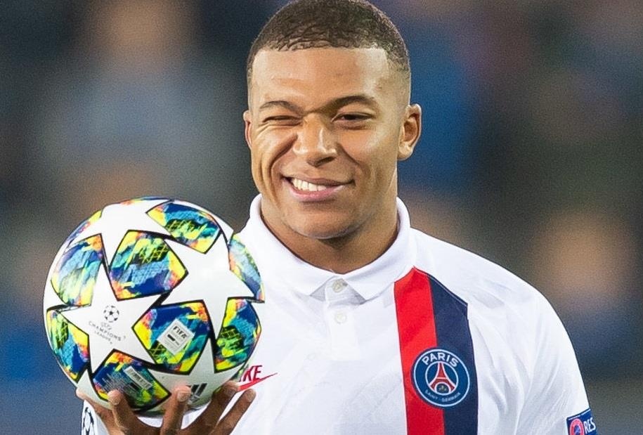 Mbappe xo do ky luc cua Messi o Champions League hinh anh