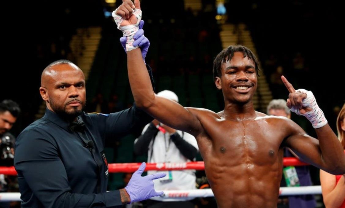 Pha knock-out sau 16 giay cua con trai huyen thoai Holyfield hinh anh