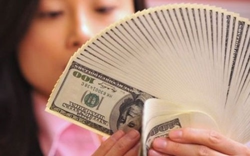 Ty gia se tang them 1%? hinh anh