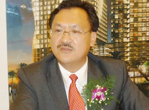 'Ho so' ong chu Tricon Towers, nguoi bi truy khap the gioi hinh anh