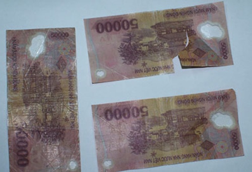 Doi tien khong du tieu chuan luu thong se khong mat phi hinh anh