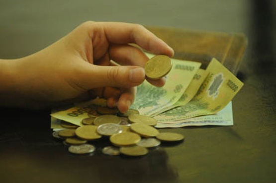 Phat hanh tien xu la sai lam cua ngan hang? hinh anh