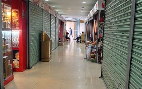 Tieu thuong Ha Noi lu luot ngung kinh doanh hinh anh