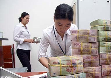 Gioi ngan hang phan ung vu 33 nha bang thuong Tet hinh anh