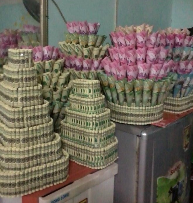 Cay tien mang tai loc chay hang ngay can Tet hinh anh