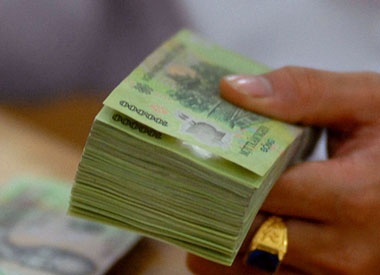 Ban gium nha, bi dong thue thu nhap ca nhan hon nua ty dong hinh anh