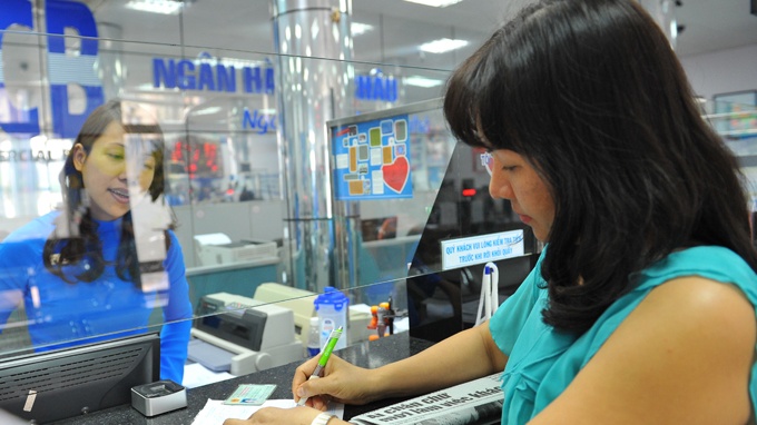 Ngan hang thi nhau giam lai suat huy dong hinh anh