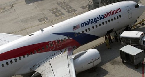 May bay mat tich, co phieu Malaysia Airlines mat gia ky luc hinh anh