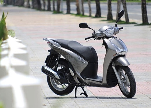 Lam the nao de nguoi Viet mua duoc xe may gia re? hinh anh