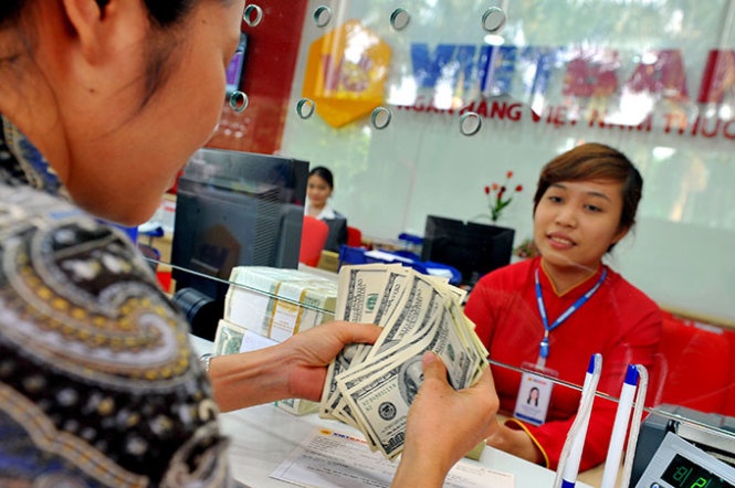 Hang tieu dung kho tang theo ty gia moi hinh anh