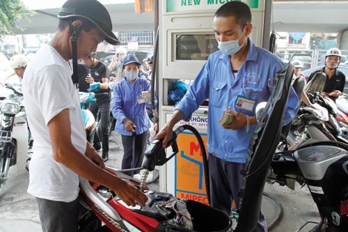 9.000 dong thue, phi/lit xang dau hinh anh