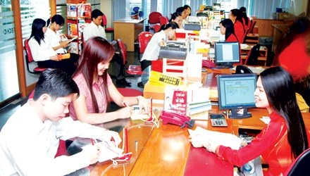 Sap bung no sap nhap ngan hang hinh anh