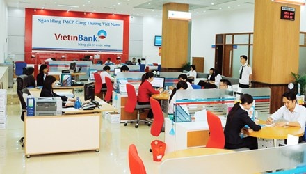 Sap bung no sap nhap ngan hang: Xu the kho cuong hinh anh