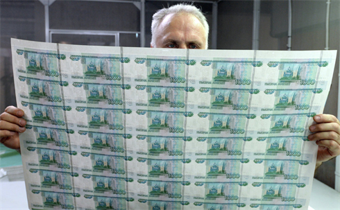 Tờ tiền đã được in đầy đủ trên tấm khổ lớn.... Đọc thêm tại: http://nongnghiep.vn/bi-mat-ben-trong-nha-may-in-tien-post138463.html | NongNghiep.vn