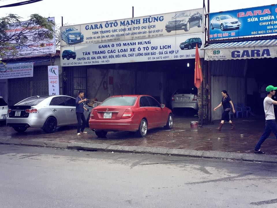 200.000 dong mot lan rua o to ngay 30 Tet o Ha Noi hinh anh
