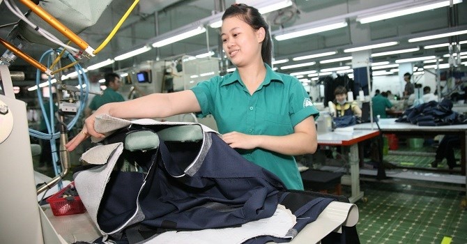 'Dut khoat phai tang luong toi thieu cho nguoi lao dong' hinh anh