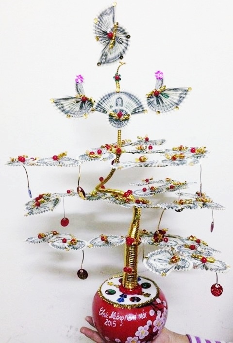 Bonsai dola hut khach dip Tet hinh anh