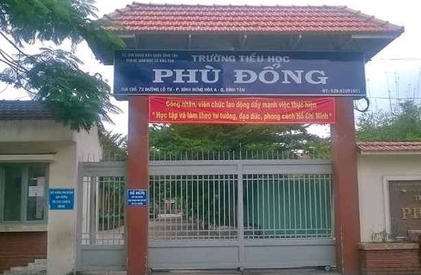 Hieu truong truong tieu hoc o Sai Gon chi sai hon 900 trieu dong hinh anh