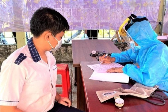 Chua tiem vaccine, hoc sinh den truong duoc ho tro the nao? hinh anh