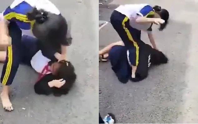 Nu sinh lop 7 o TP.HCM bi ban danh hoi dong hinh anh