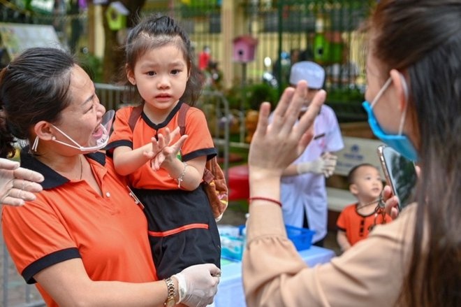 Tre mam non ca nuoc tro lai truong trong thang 2 hinh anh