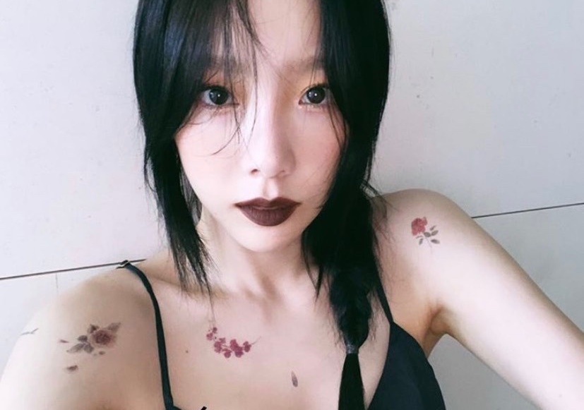Taeyeon lo than hinh gay go khi dien vay ao hai day khoe hinh xam hinh anh
