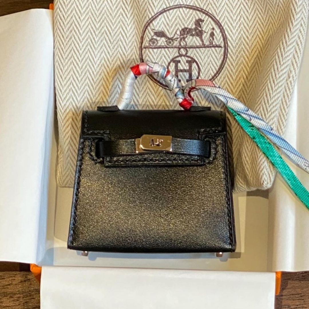 Paris Hilton mua tui xach cho cho anh 1