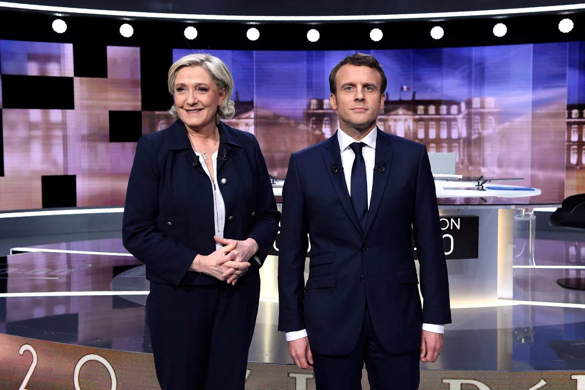 Cuộc chiến thời trang ông Macron và bà Le Pen ảnh 1 Cuoc chien thoi trang ong Macron va ba Le Pen anh 1