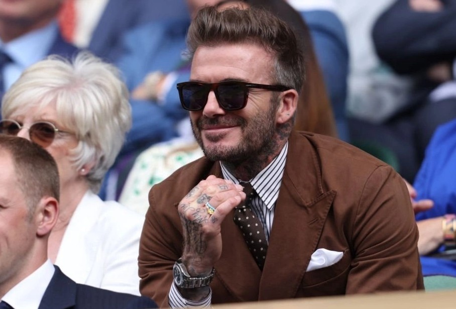 Dang sau nhung bo suit cua David Beckham hinh anh