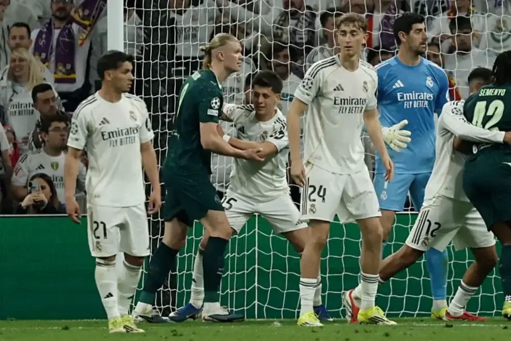 Real co li khi cu Guler kem chat Haaland hinh anh