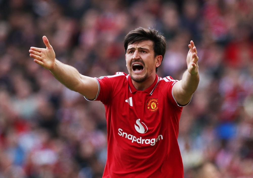 Maguire vua gia han da dung truoc cua roi MU hinh anh