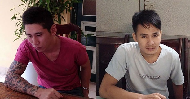 Tú (trái) và Hoàng tại cơ quan công an.